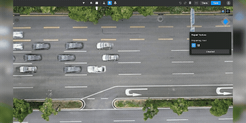 En drönarvy av en flerfilig motorväg med flera bilar i rörelse, omgiven av grönska och med ett markeringsverktyg på skärmen.