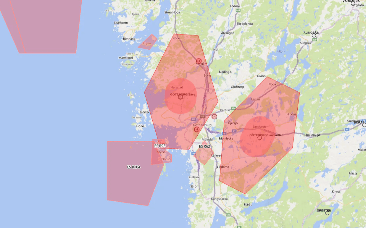 Karta som visar olika flygzoner och restriktionsområden i ett område