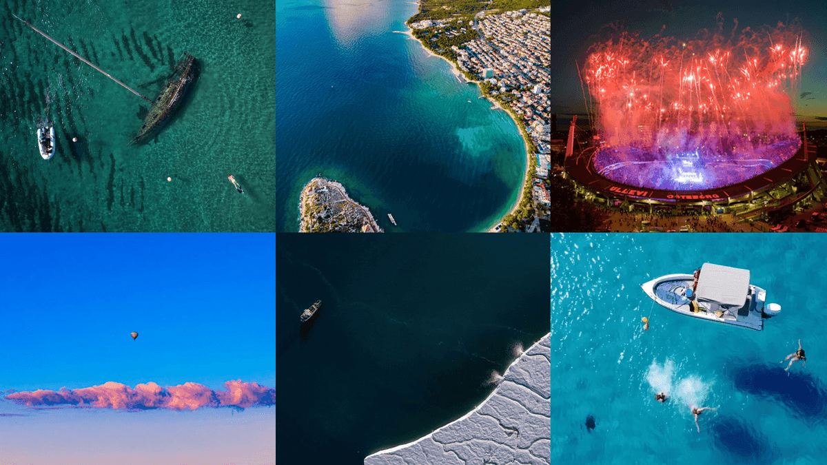 1. Båt nära sjunket skepp i klart vatten.
2. Kuststad vid turkost hav från ovan.
3. Stadion med fyrverkerier i natten.
4. Luftballong över rosa moln mot blå himmel.
5. Fartyg nära iskant i mörkt vatten.
6. Båt med simmare i kristallklart hav.
