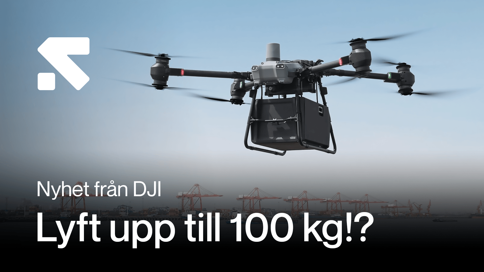 En kraftfull drönare från DJI svävar över en hamn, med kapacitet att lyfta upp till 100 kg. en-kraftfull-dronare.png